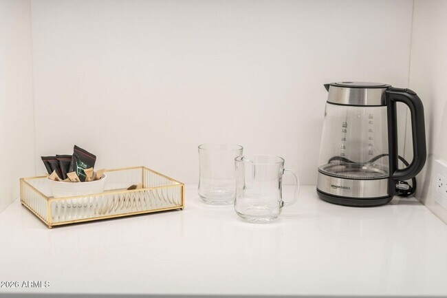 Building Photo - 6587 N Palmeraie Blvd