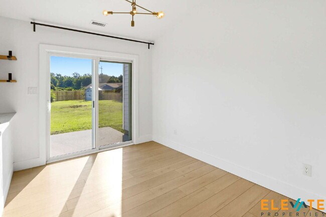 Building Photo - Beautiful Like-New 3 Bedroom Home with Huge Fenced Yard, Greenhouse & Storage