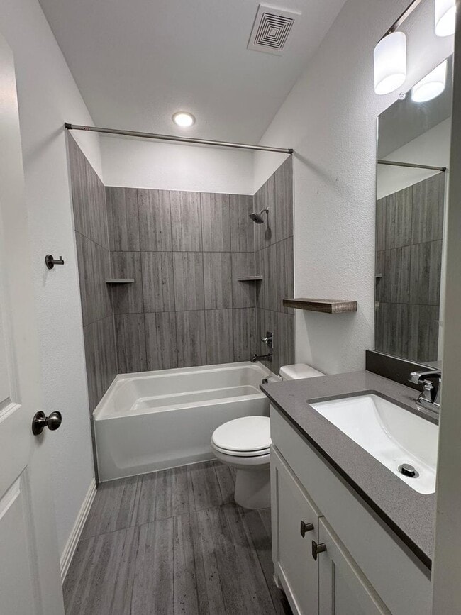 Building Photo - FULLY UPGRADED LUXURY TOWNHOME located in ...