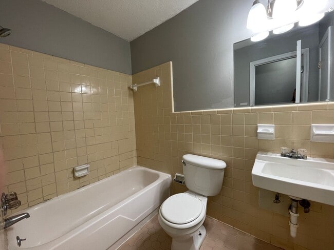 Building Photo - 4-BEDROOM + BONUS ROOM - Beautiful, Shady Residential Area