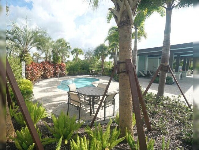 Building Photo - Stunning 5-Bedroom Lakeview Home in River Landing, Wesley Chapel