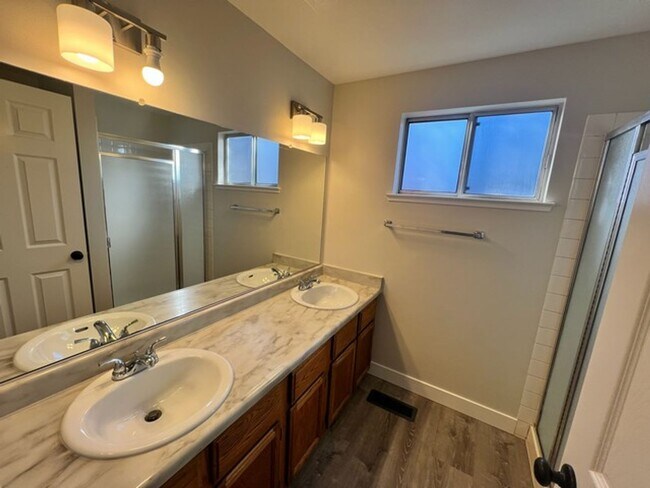 Building Photo - Refreshed Sparks Three Bedroom - Front Landscaping Included