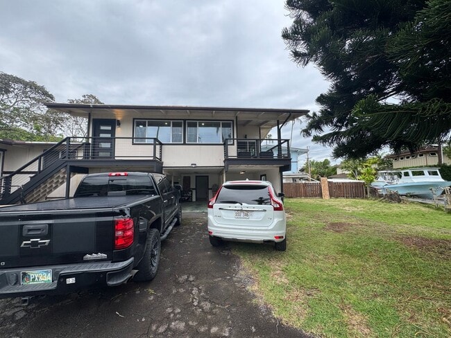 Building Photo - Completely Renovated 2 Bedroom/ 1 Bath with Ocean Access, Yard, Storage, Carport, A/C, Pets Allowed