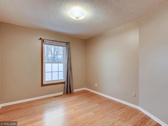 Second bedroom has hardwood floors and large closet - 7301 W 109th St