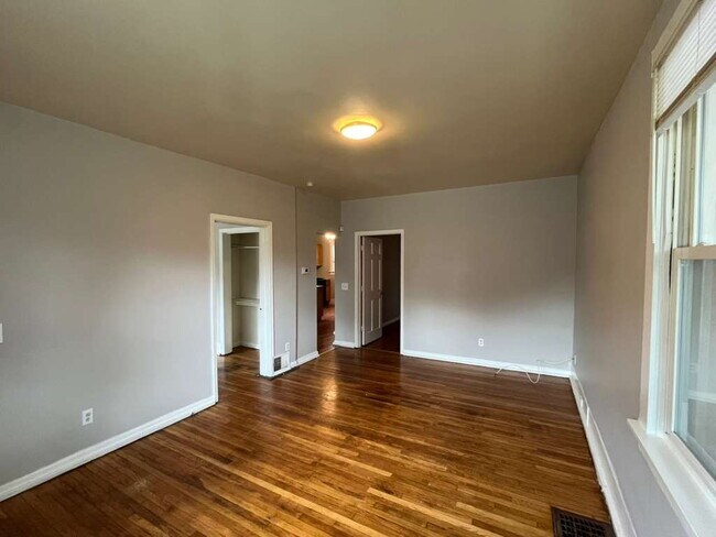 Building Photo - "Charming 2-Bedroom Retreat with Wood Floors with Basement!"
