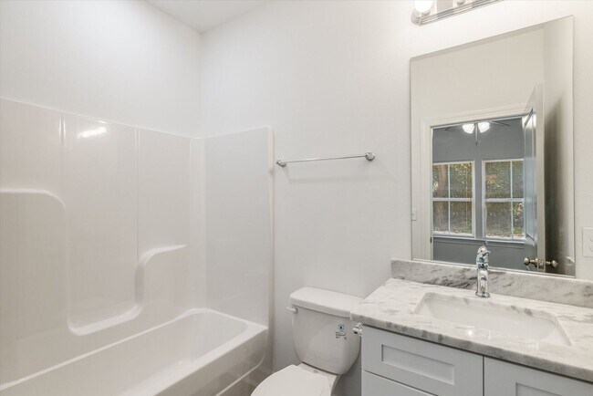 Building Photo - 5/5.5 Townhomes, Built 2024, Walk to stadium! Available August 2026!