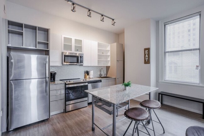 Building Photo - 9-JAN-JAN E 4th St