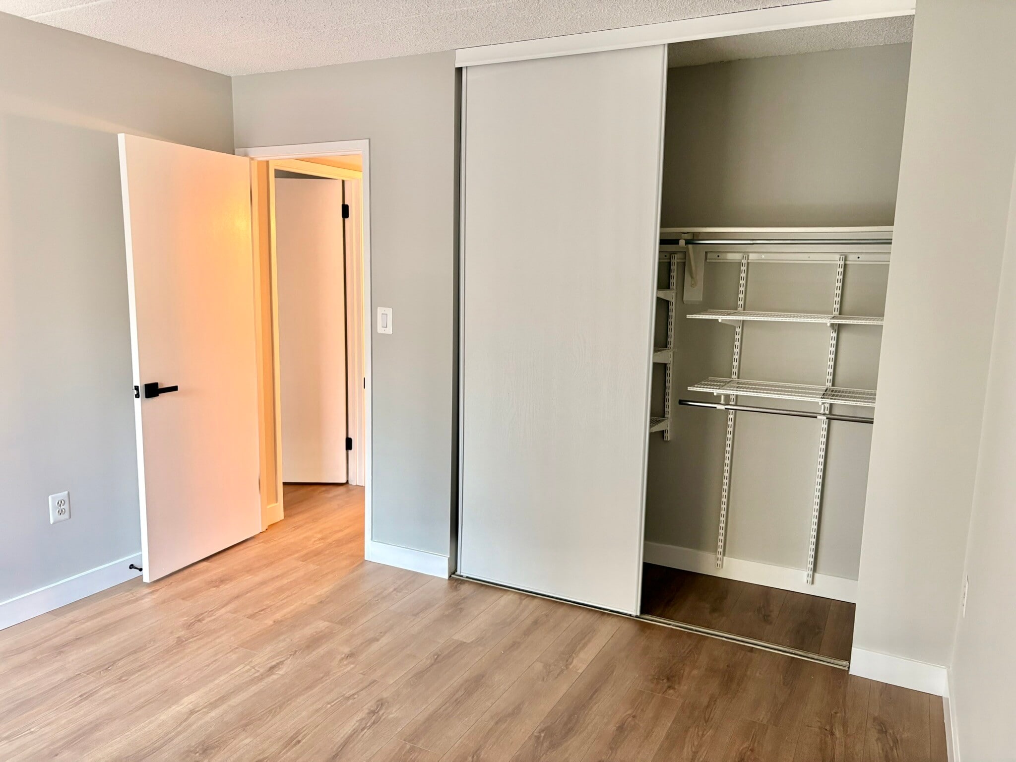 Second bedroom closet with Elfa system - 11557 Rolling Green Ct