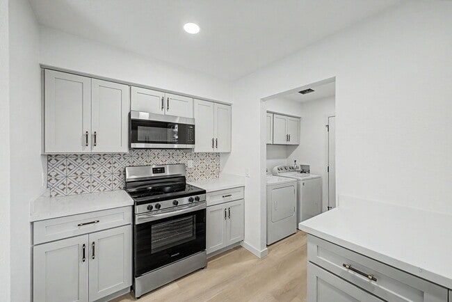 Building Photo - Remodeled 3BR End Unit Townhome in South Tempe | Private Yard + Covered Parking