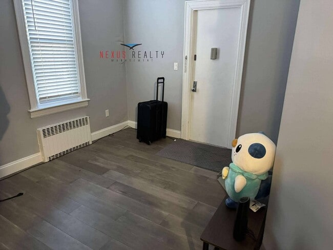 Building Photo - 21-44-44 71st St