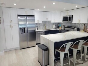 Building Photo - 19390 Collins Ave