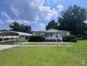 Building Photo - McDougald Downs- Darby Drive