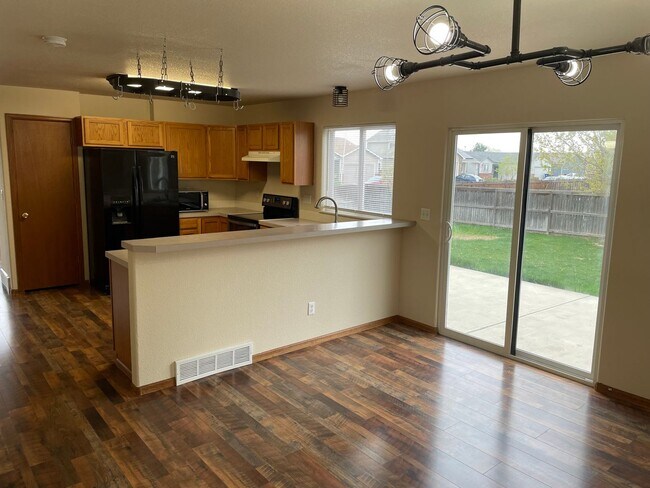 Building Photo - Beautiful 3 Bed 2.5 Bath Home in Milliken, Huge Corner Lot, Fenced Yard & Unfinished Basement