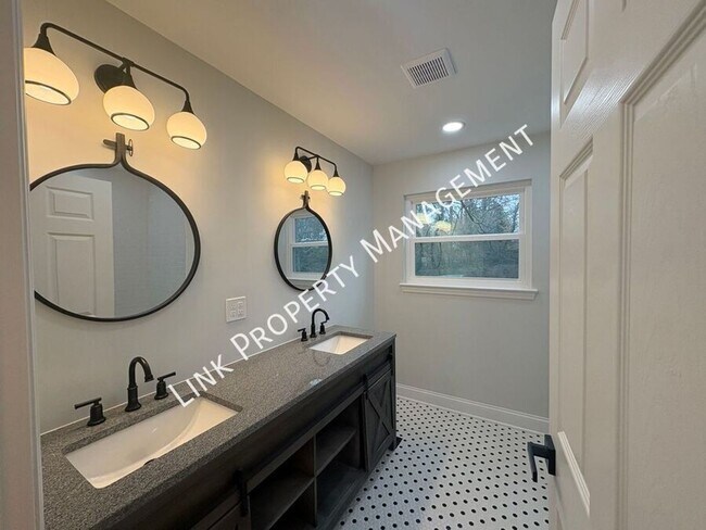 Building Photo - JUST REDUCE!  Sophisticated Tri-Level Home in Stuart Heights — Modern Comfort & Timeless Charming...