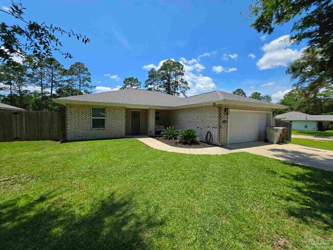 Building Photo - 5565 Riviera Dr