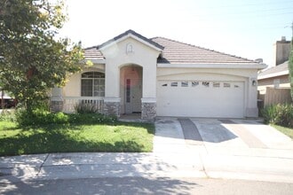 Building Photo - 4bed | 2bath | 1715SF | 2 Car Garage | Single Story | Tenant pays $190 monthly for WS&G
