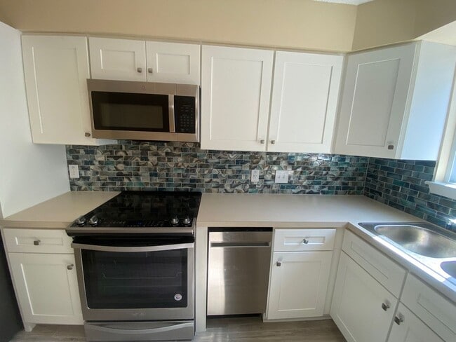 Building Photo - Enjoy coastal living at its finest!  "ASK ...