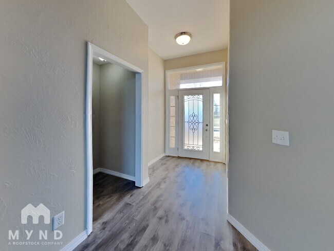 Building Photo - 5697 W Alexa Ln