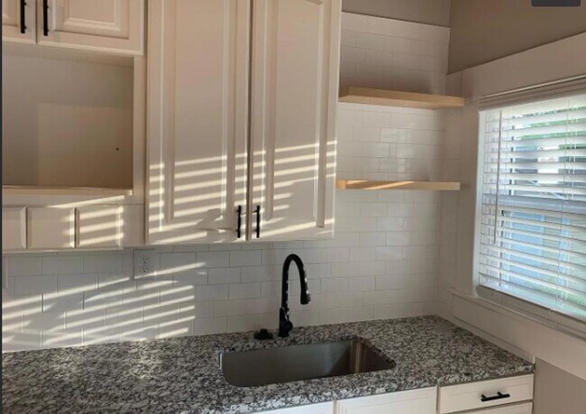 Building Photo - Welcome to Your Next Home with Harvest Investments!