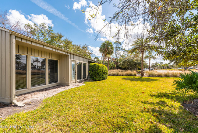 Building Photo - 9996 Sawgrass Dr E