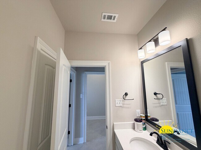 Building Photo - Custom-crafted details shine throughout this stunning 3-bedroom home in Magnolia at the Bluffs in...