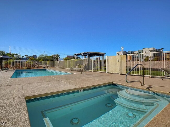 Building Photo - Enjoy resort-style living in this 2 Bed 2 Bath Condo with Stunning Strip Views in the Wimbledon C...