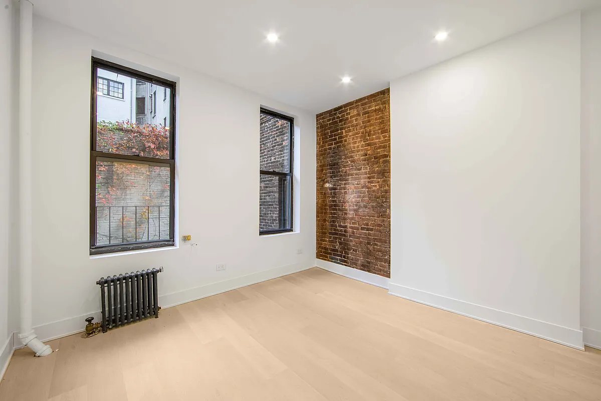 Building Photo - 51 W 8th St