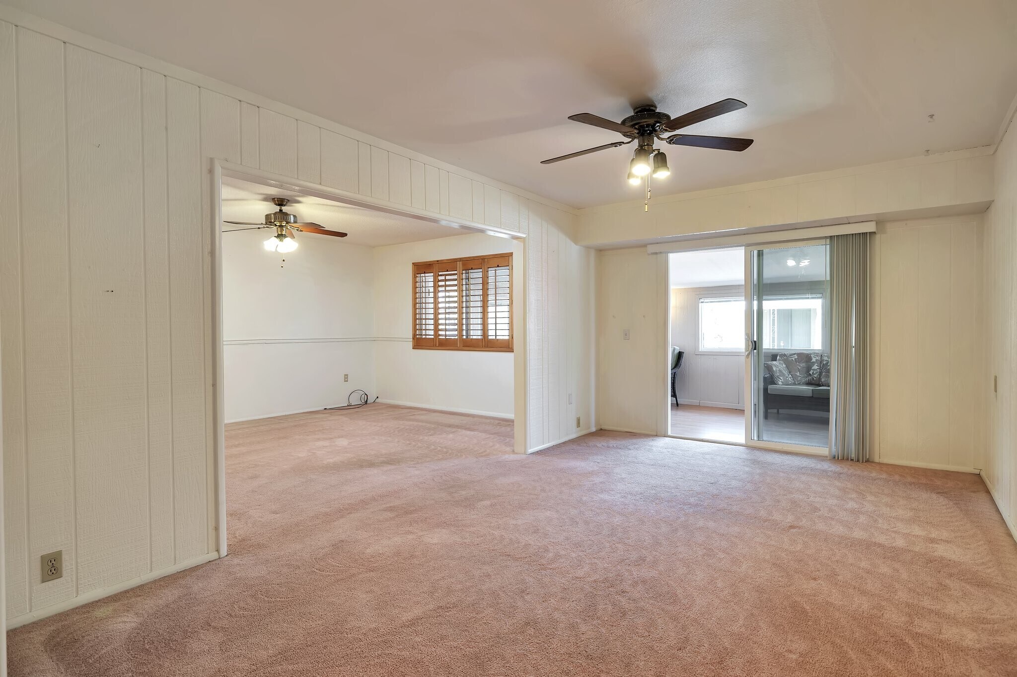 Large Family Room looking out to Arizona Room and Living Room - 11040 W Salem Dr