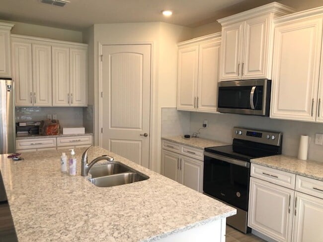 Building Photo - ALMOST NEW 4 BDRM home in GATED ROSECREST!