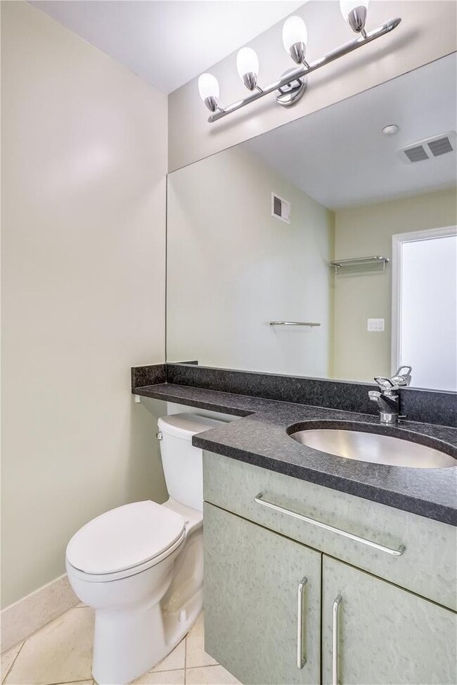 Building Photo - Updated townhome in popular Paper Mill Cou...