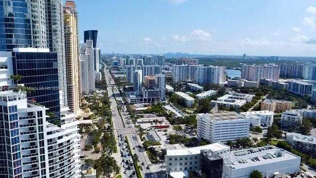 Building Photo - 18201 Collins Ave