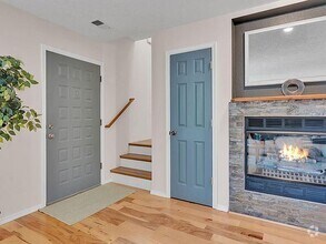 Building Photo - Single-level living at its finest! This co...