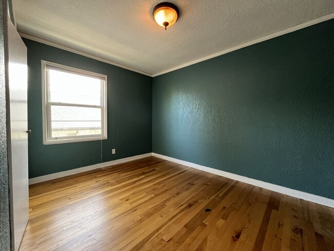 Building Photo - Stylish Condo at Terrazzo with Hardwood Floors, Open Modern Kitchen & Great Location