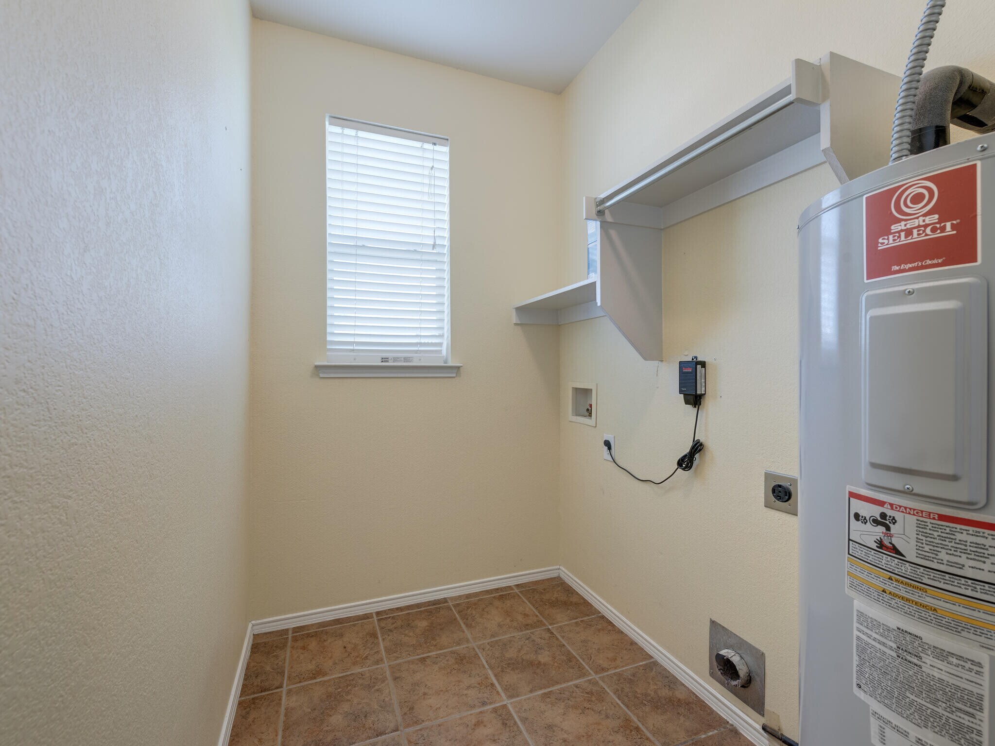 Full Laundry Room with Hook Ups - 10528 Astor Dr