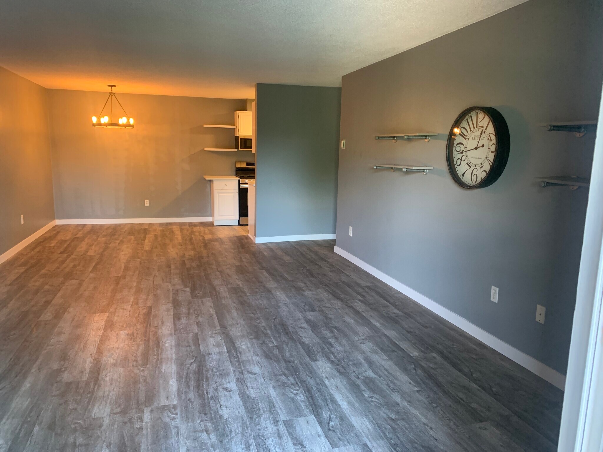 Living room to kitchen - 4820 Park Commons Dr