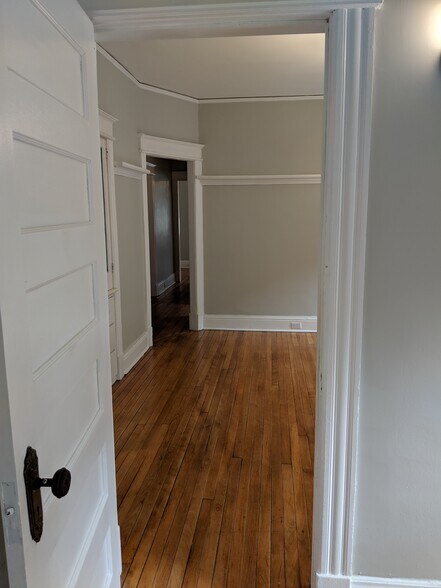 View of Dining Room to Hallway from Bedroom 3 - 32 Pawling Avenue