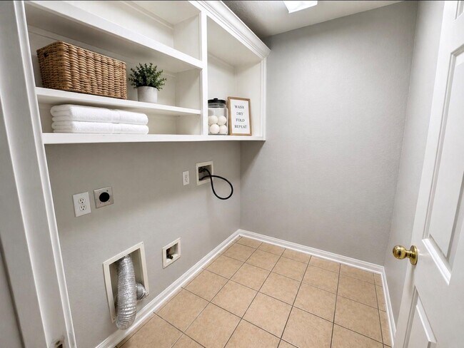 Building Photo - Hollyhock Drive, Stafford, TX 77477 - 4 BR 2 BA single-family home