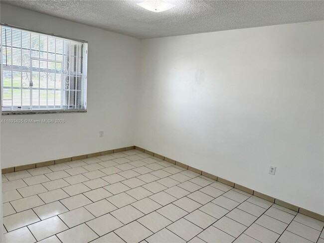 Building Photo - 8990 SW 24th St