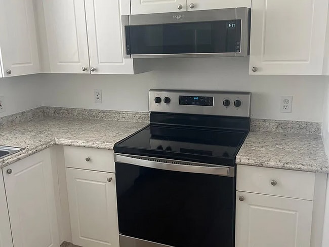 Building Photo - 4006 Roclinata Palm Ct