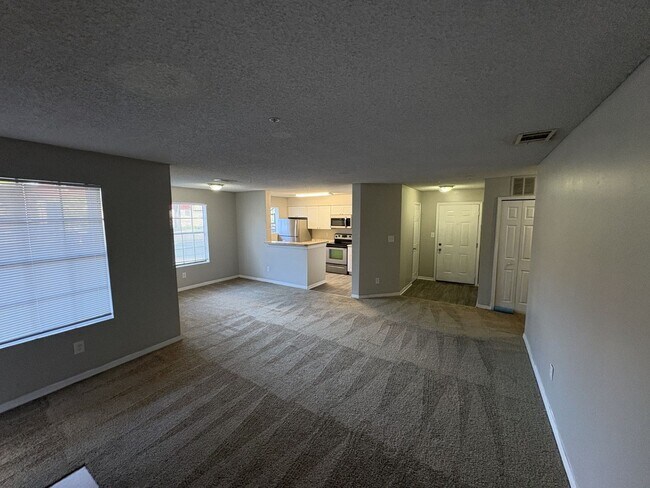 Building Photo - 1st floor unit with fire place and large patio