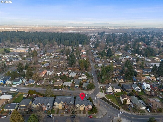 Building Photo - Spacious 3 Bedroom Townhome with Stainless Steel Appliances, Attached Garage & Open Layout