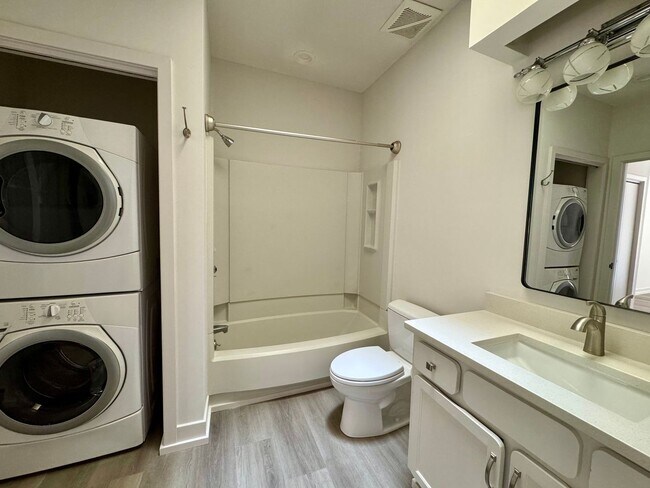 Building Photo - Spacious 2-Story Falconbridge Condo with Private Courtyard and Resort-Style Amenities