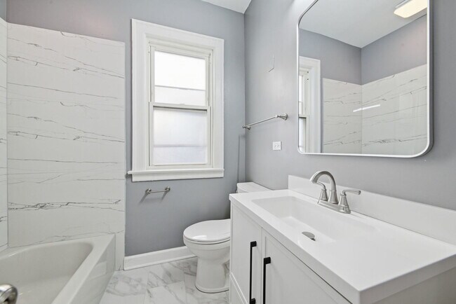 Building Photo - 8024 S Vernon Ave