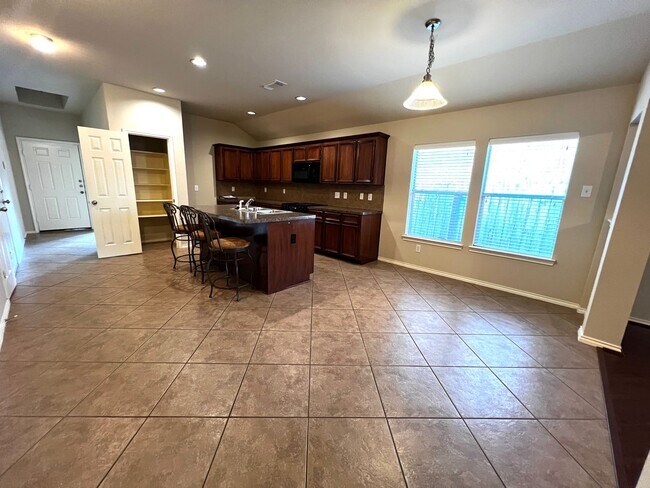 Building Photo - Charming 3-Bedroom Home with Modern Kitchen and Spacious Backyard