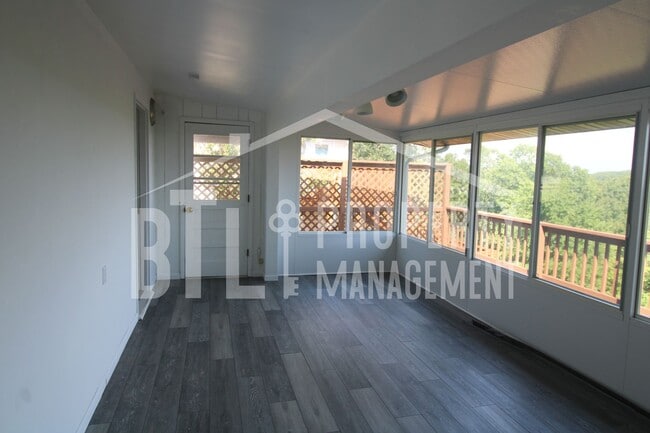 Building Photo - Beautiful Home with a Lakeview! Bonus Sunroom!