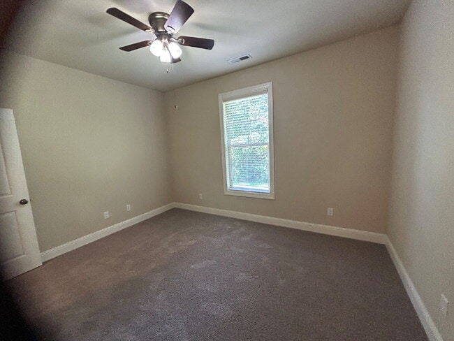 Building Photo - 2BD 2BA GROUND LEVEL DUPLEX WITH GARAGE FO...