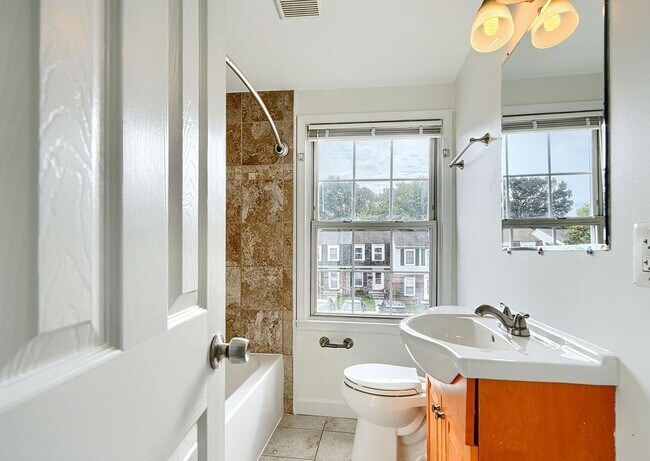 Building Photo - Updated End-of-Group Townhome with Finished Lower Level, Fenced Yard & Community Pool