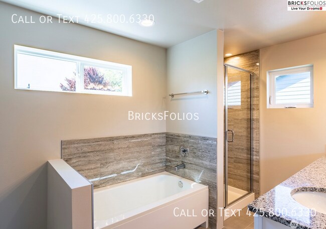 Building Photo - Welcome to Comfort and Charm in Your Monro...