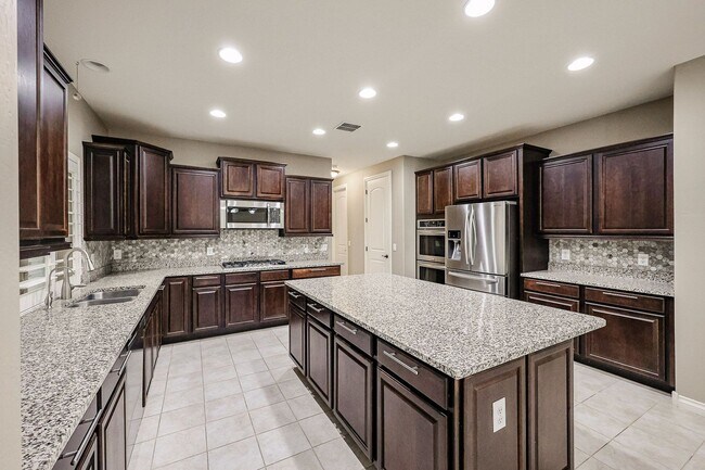 Building Photo - COMING SOON! Great Location!Stunning 6-bedroom Plus 7, 4.5-bathroom home located in Chandler
