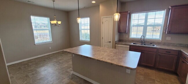 Building Photo - "Charming 3-Bedroom Townhouse Retreat in Colorado Springs – Spacious 1704 Sq Ft with 2.5 Bathrooms!"